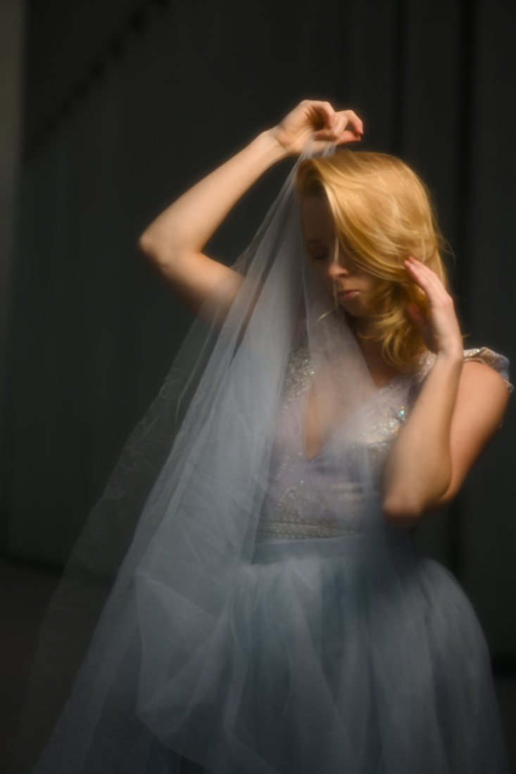Dramatic studio portrait in low light